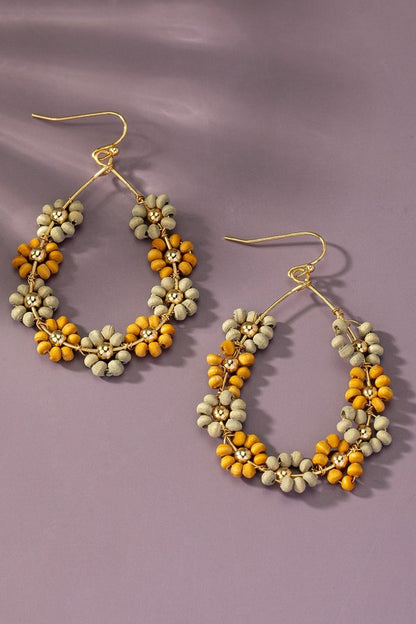 Hand done multi wood beaded flower hoop earrings