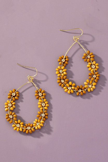 Hand done multi wood beaded flower hoop earrings