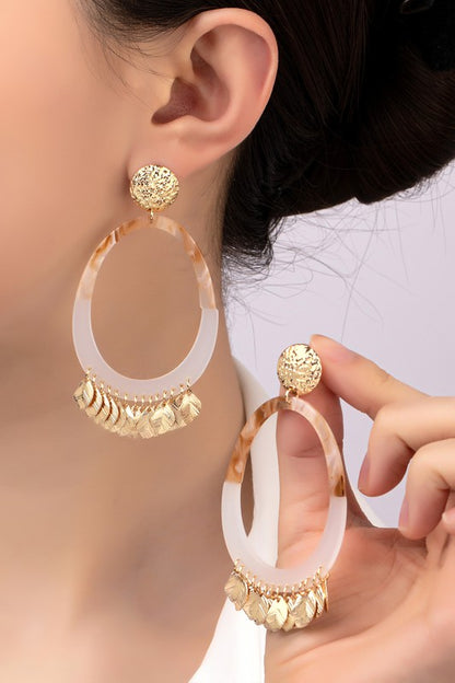 Oval acetate hoop earrings with leaf drops