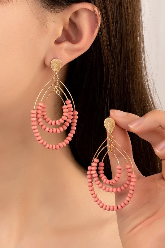 I N S T O C K Three tier wood oval hoop earrings